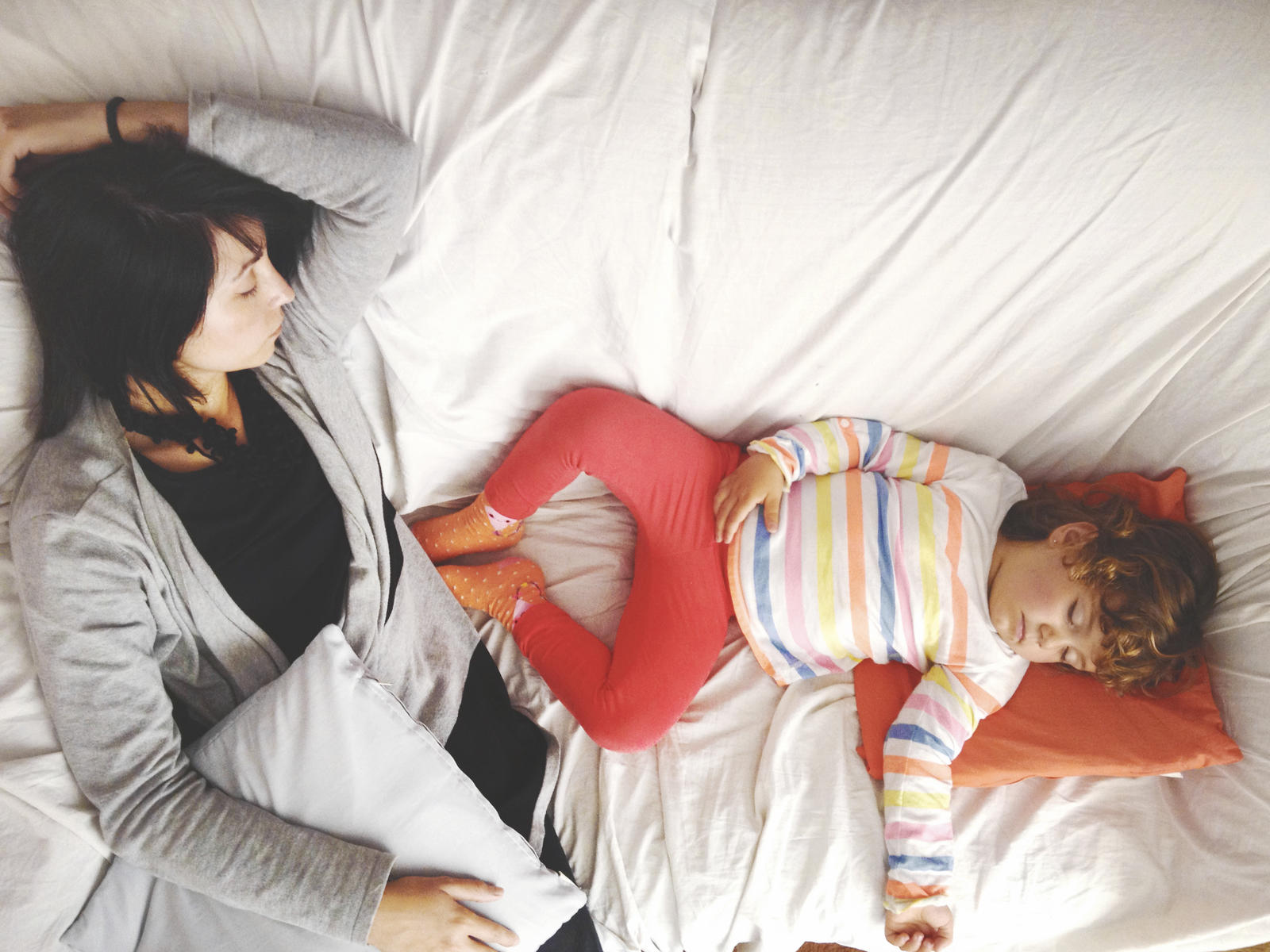 mom and toddler bed sharing