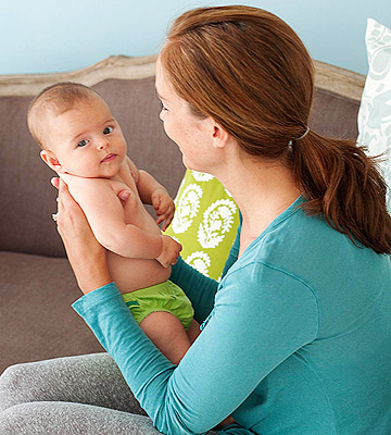 woman holding baby