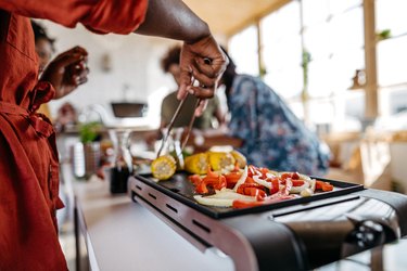 Vegetables on grill pan indoors