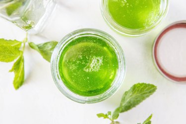 Open jar of mint jelly